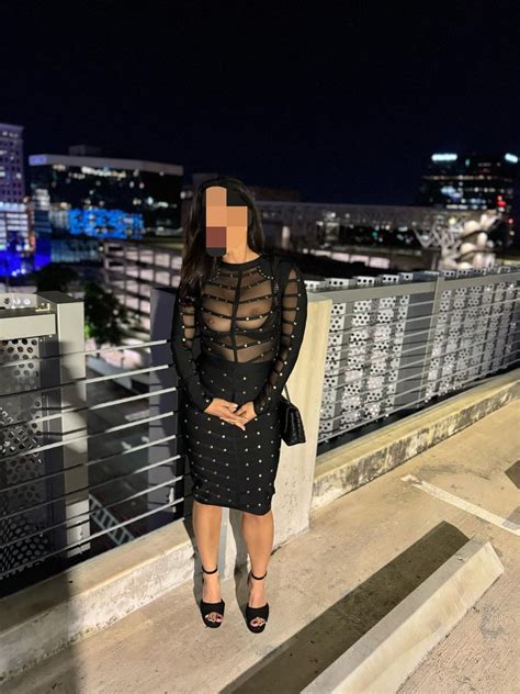 Girls dressed provocatively in a public setting .